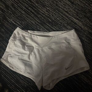 White Nike shorts